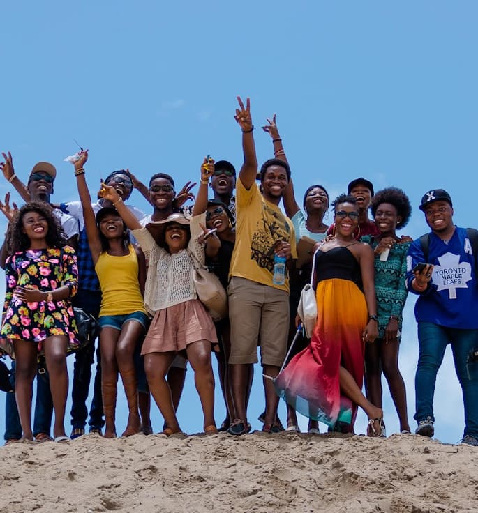 Friends celebrating together on a beach